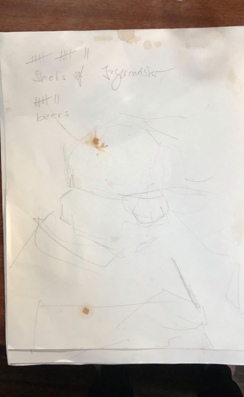 A faint, barely held together pencil drawing with stains, noted: 12 shots of Jägermeister, 7 beers