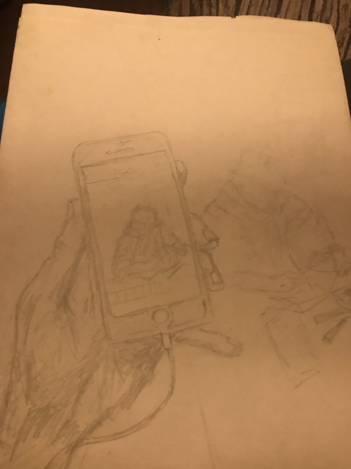 A hand holding a phone, the screen showing the person drawn behind it
