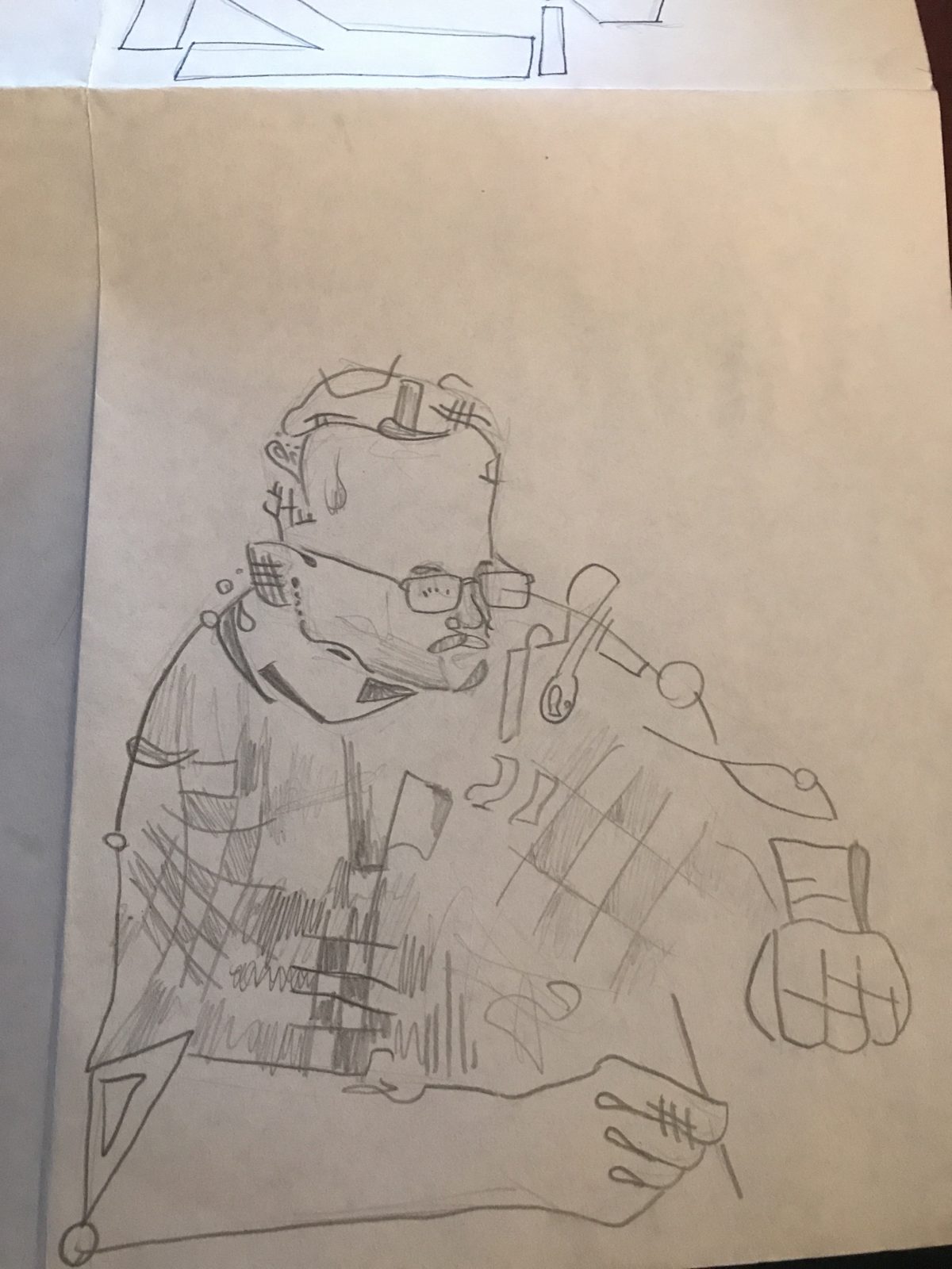 Pencil portrait of a man with glasses, his sweater full of patterns