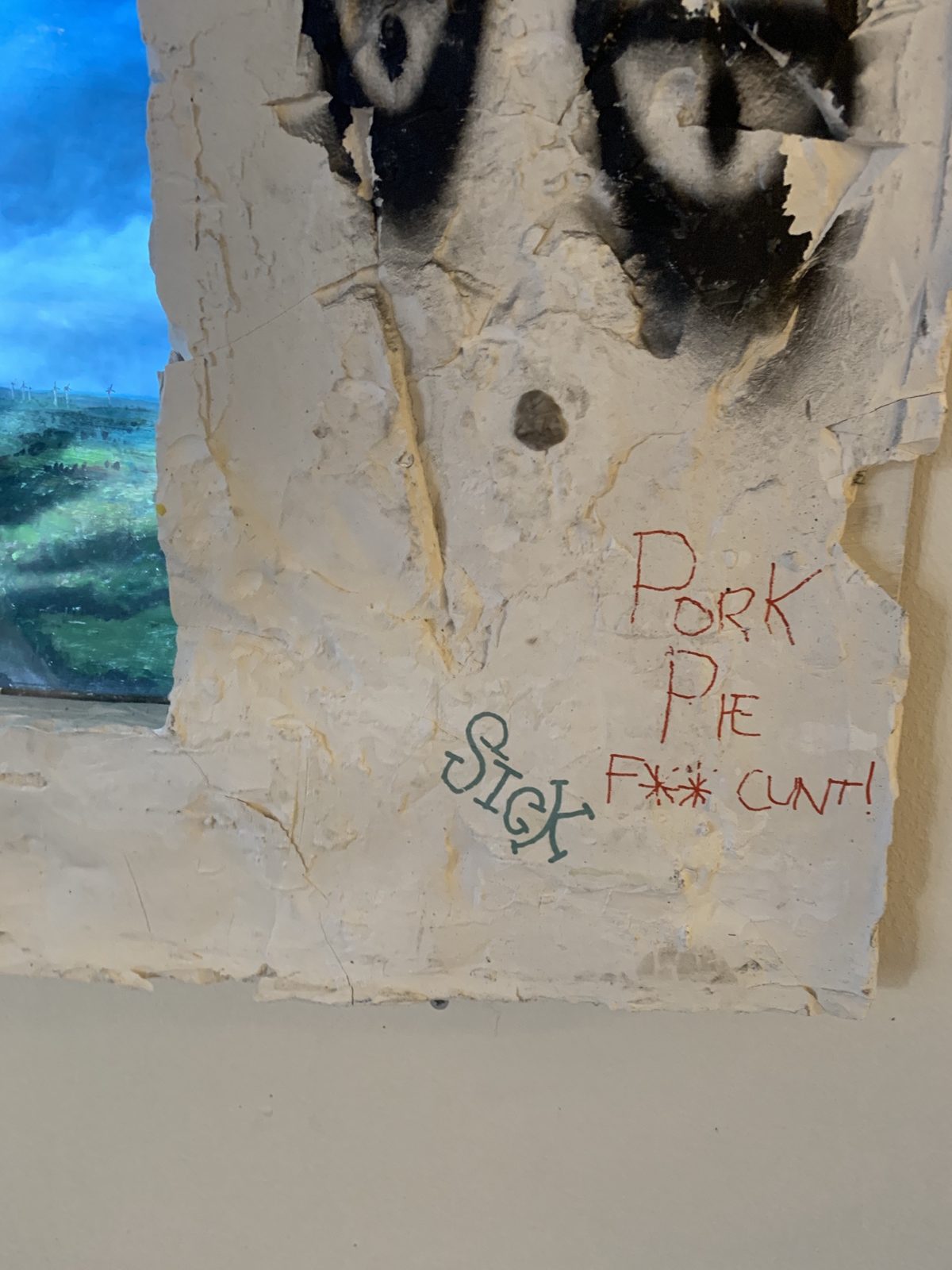 Detail: PORK PIE and SICK written next to the painting