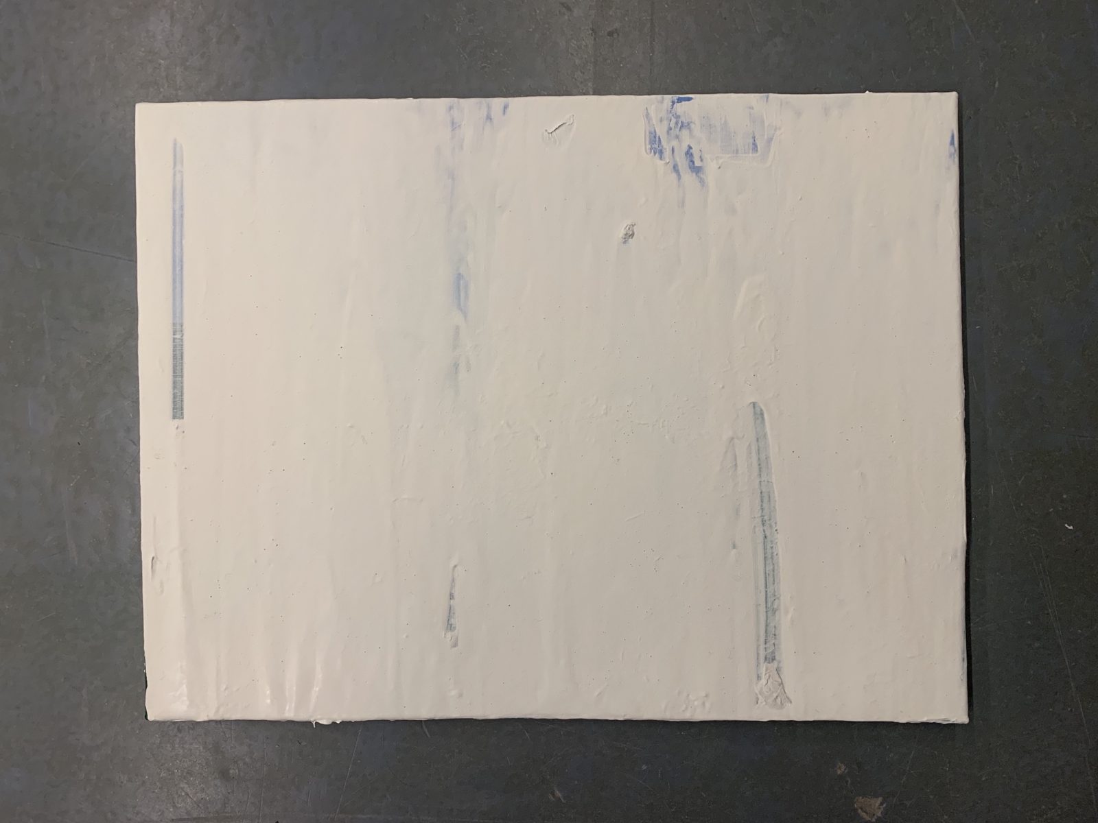 The canvas afterwards, almost fully white, a few strips of blue sky showing through