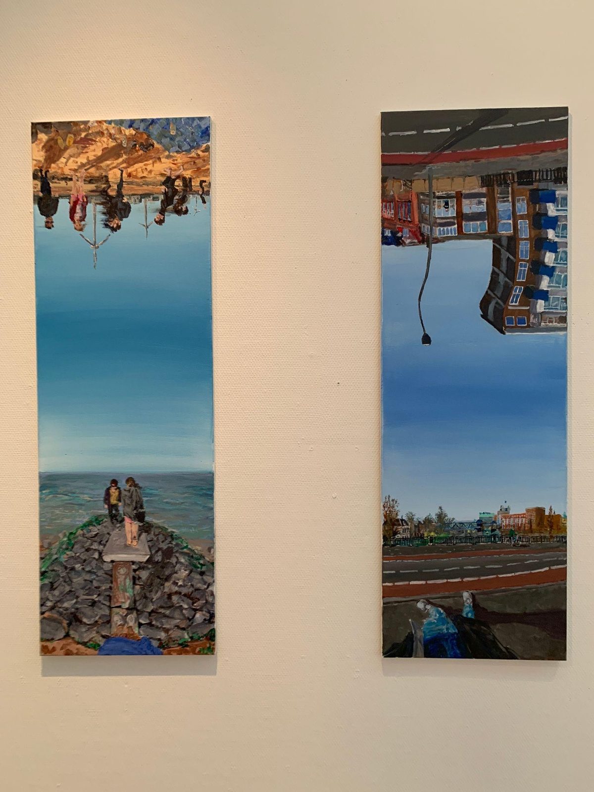 Two folded landscape paintings